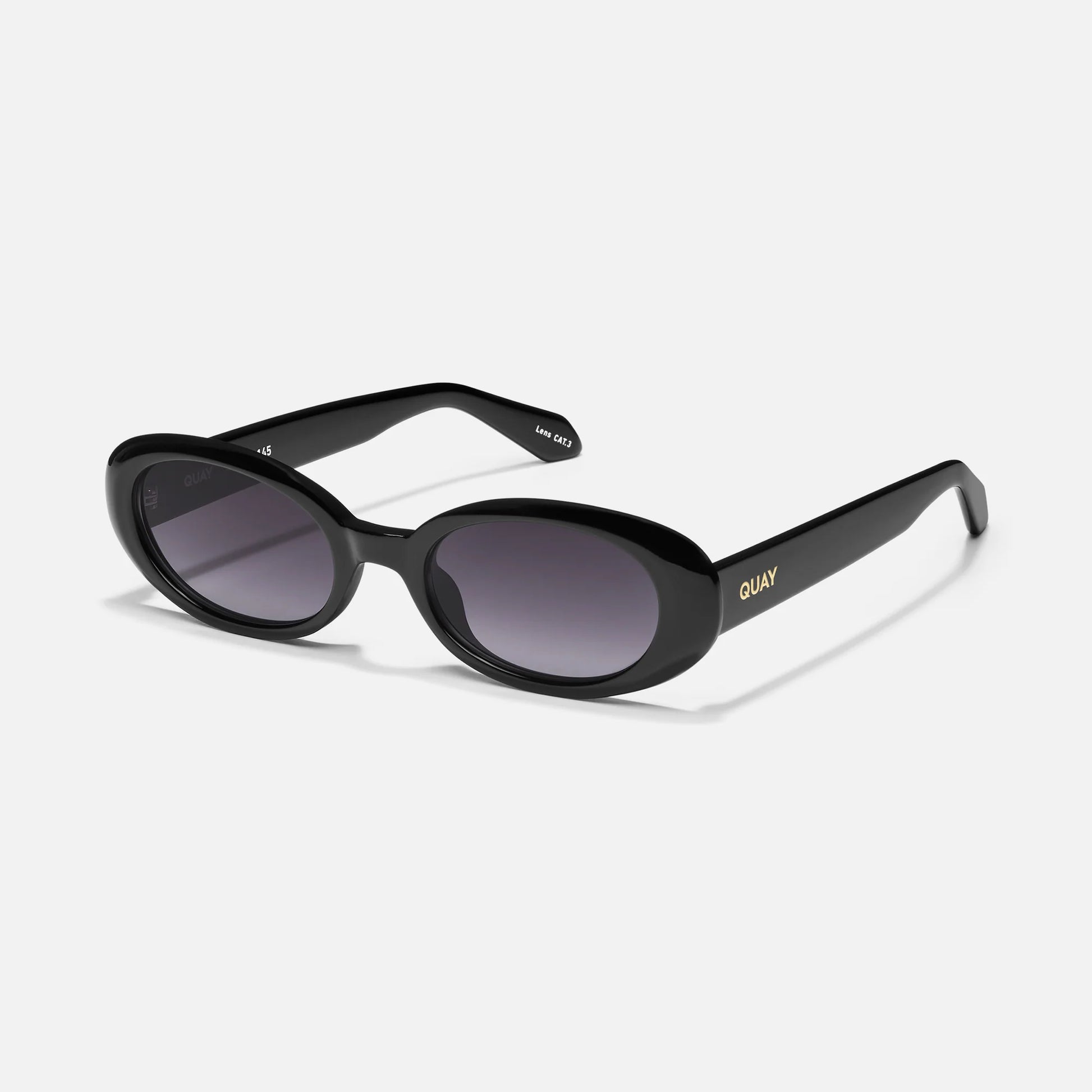 Black sunglasses with gradient lenses on a white background