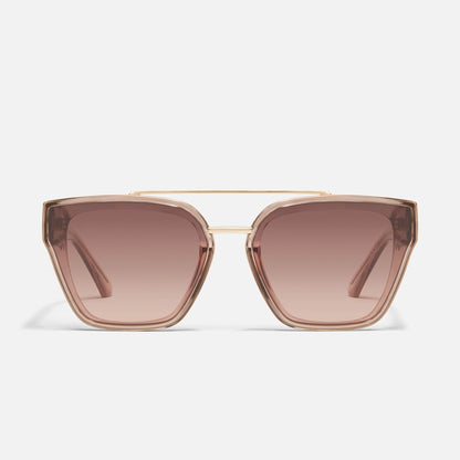 Sunglasses with gold frame and brown lenses on a light gray background
