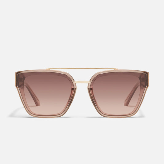 Sunglasses with gold frame and brown lenses on a light gray background