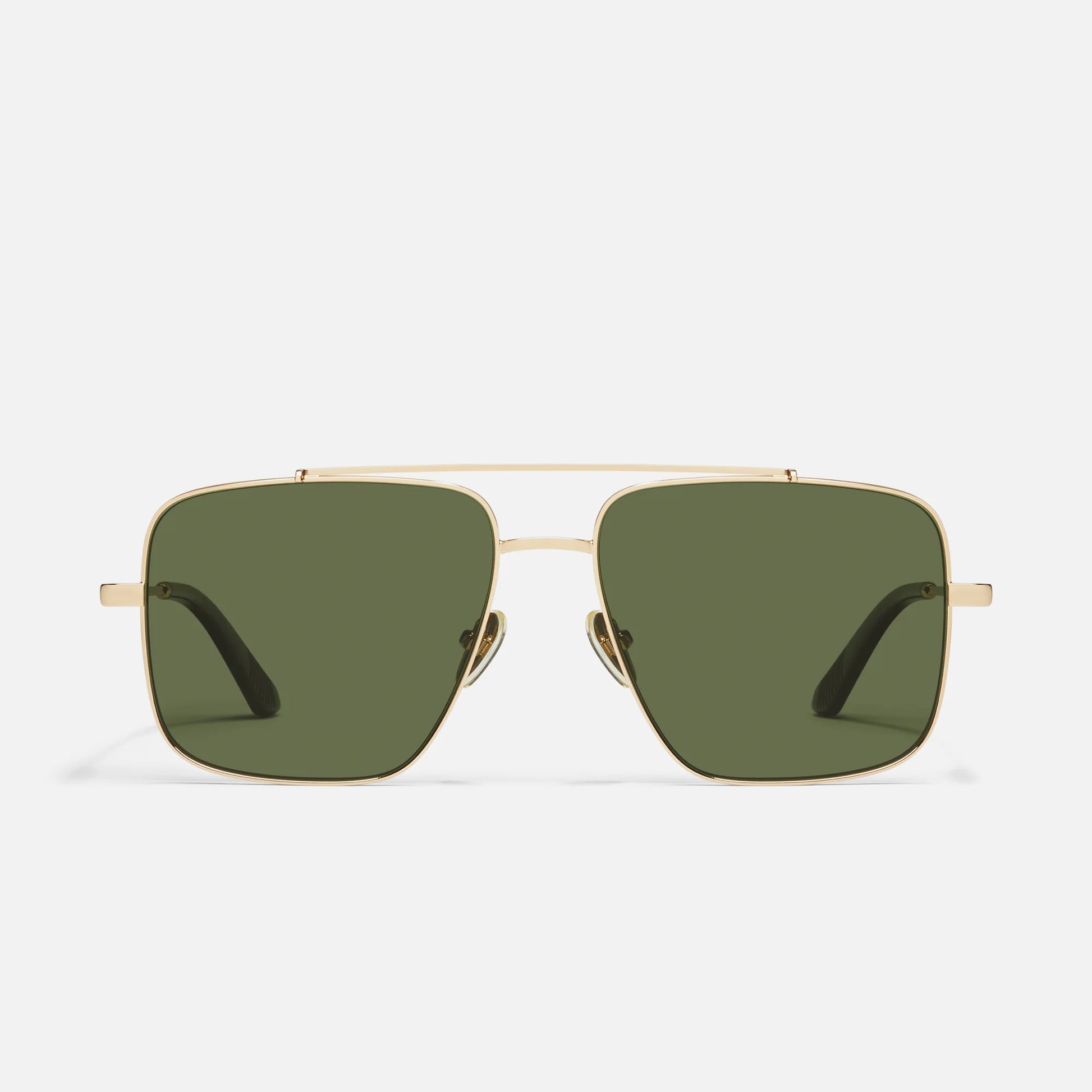Gold-framed sunglasses with green lenses on a white background