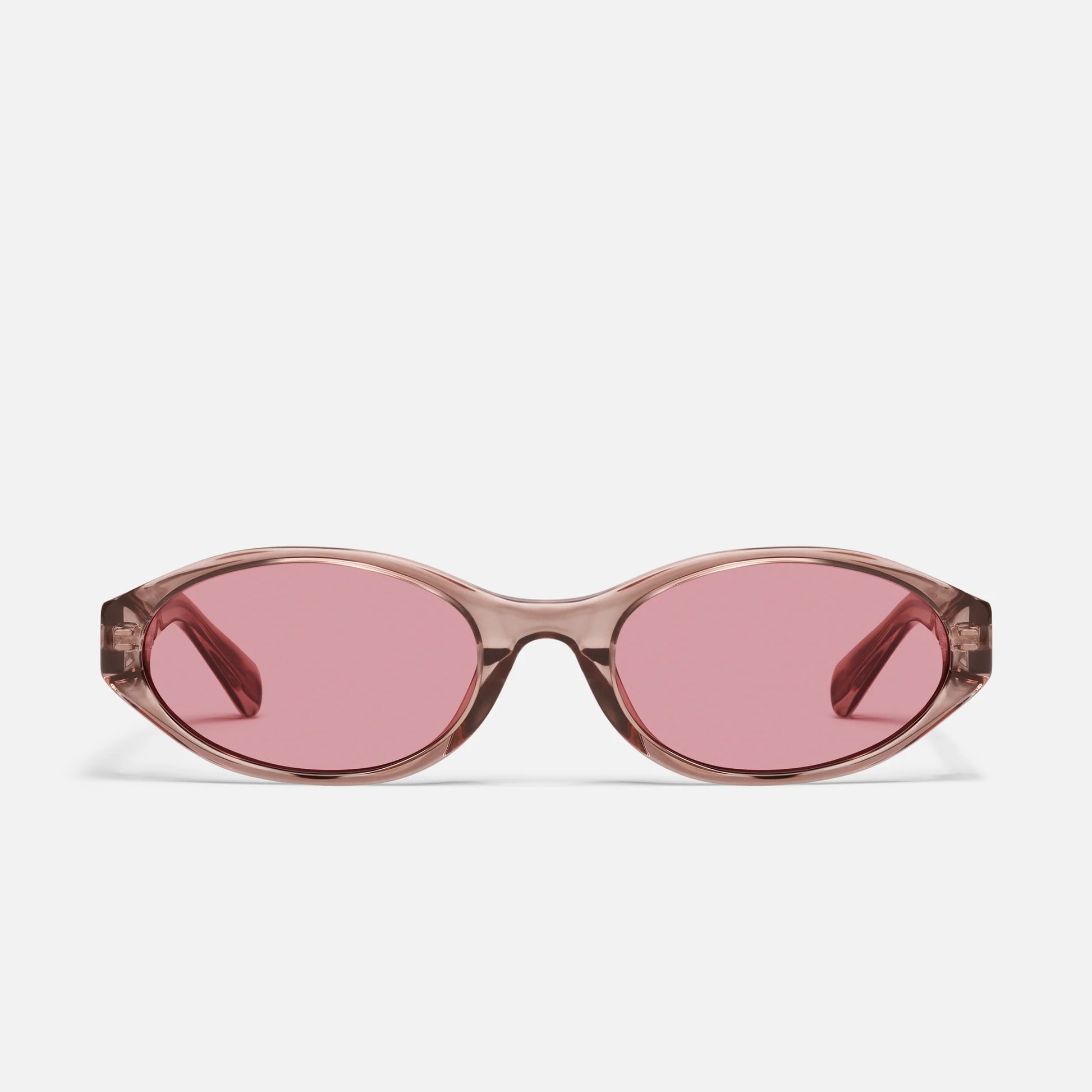 Sunglasses with pink lenses on a white background