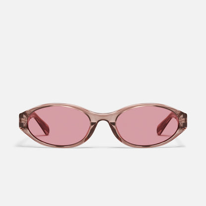 Sunglasses with pink lenses on a white background