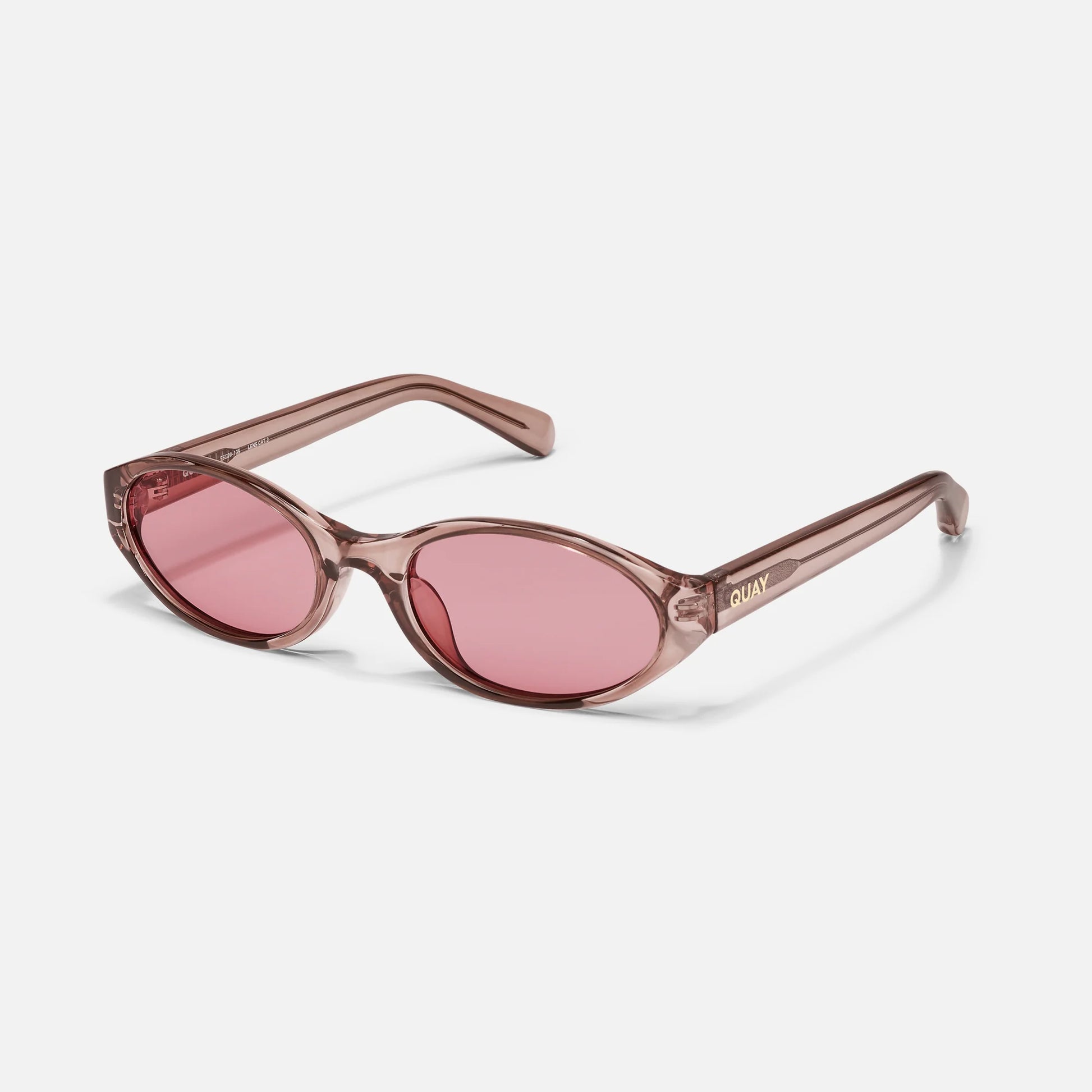 Sunglasses with pink lenses and brown frame on a white background