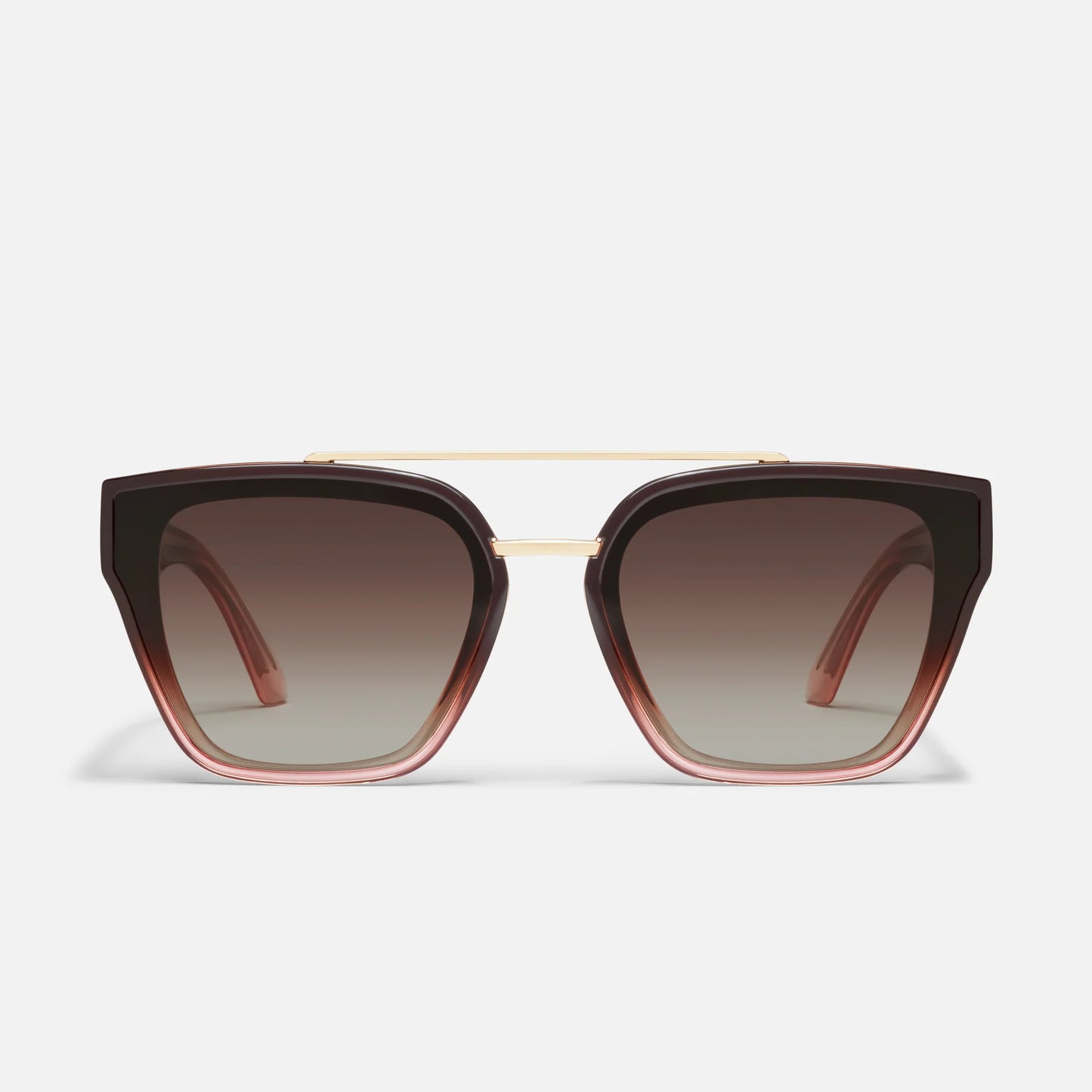 Sunglasses with brown gradient lenses and gold frame on a light gray background