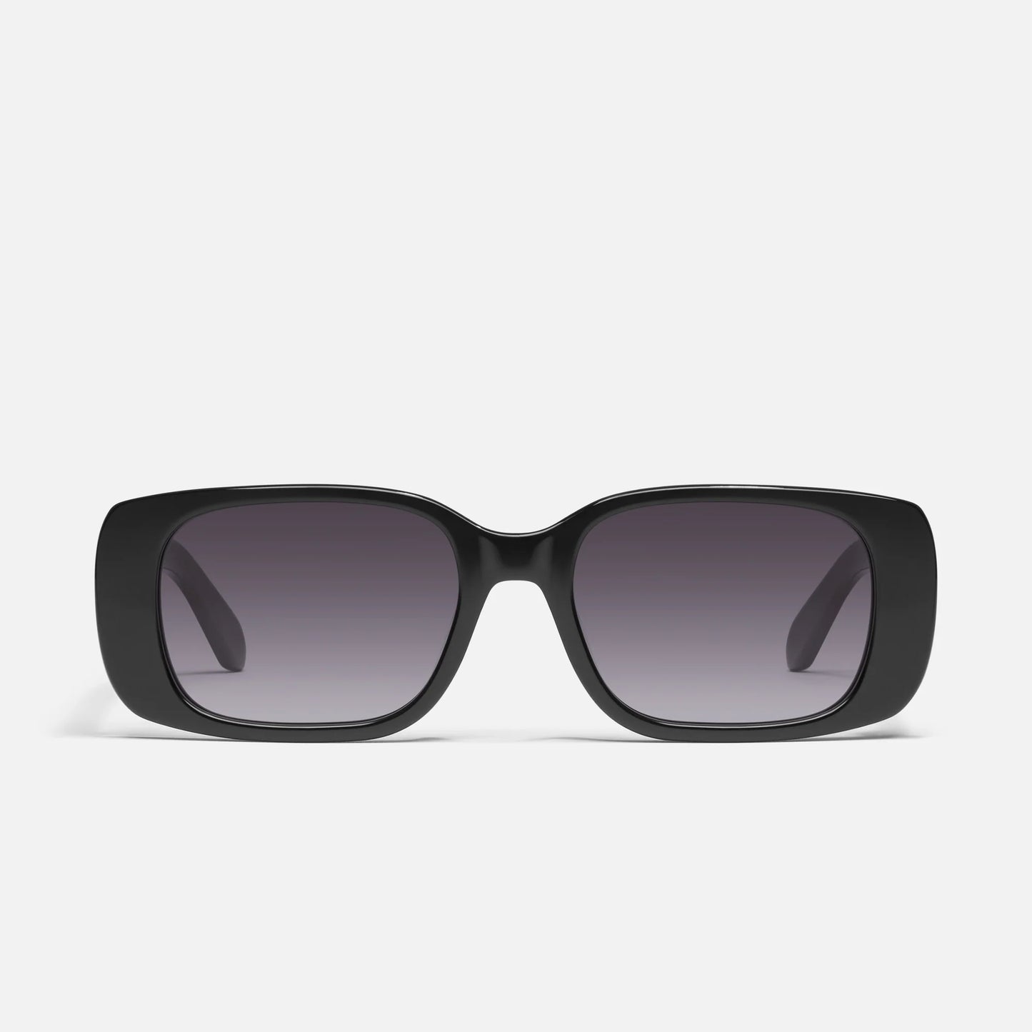 Black sunglasses with gradient lenses on a white background