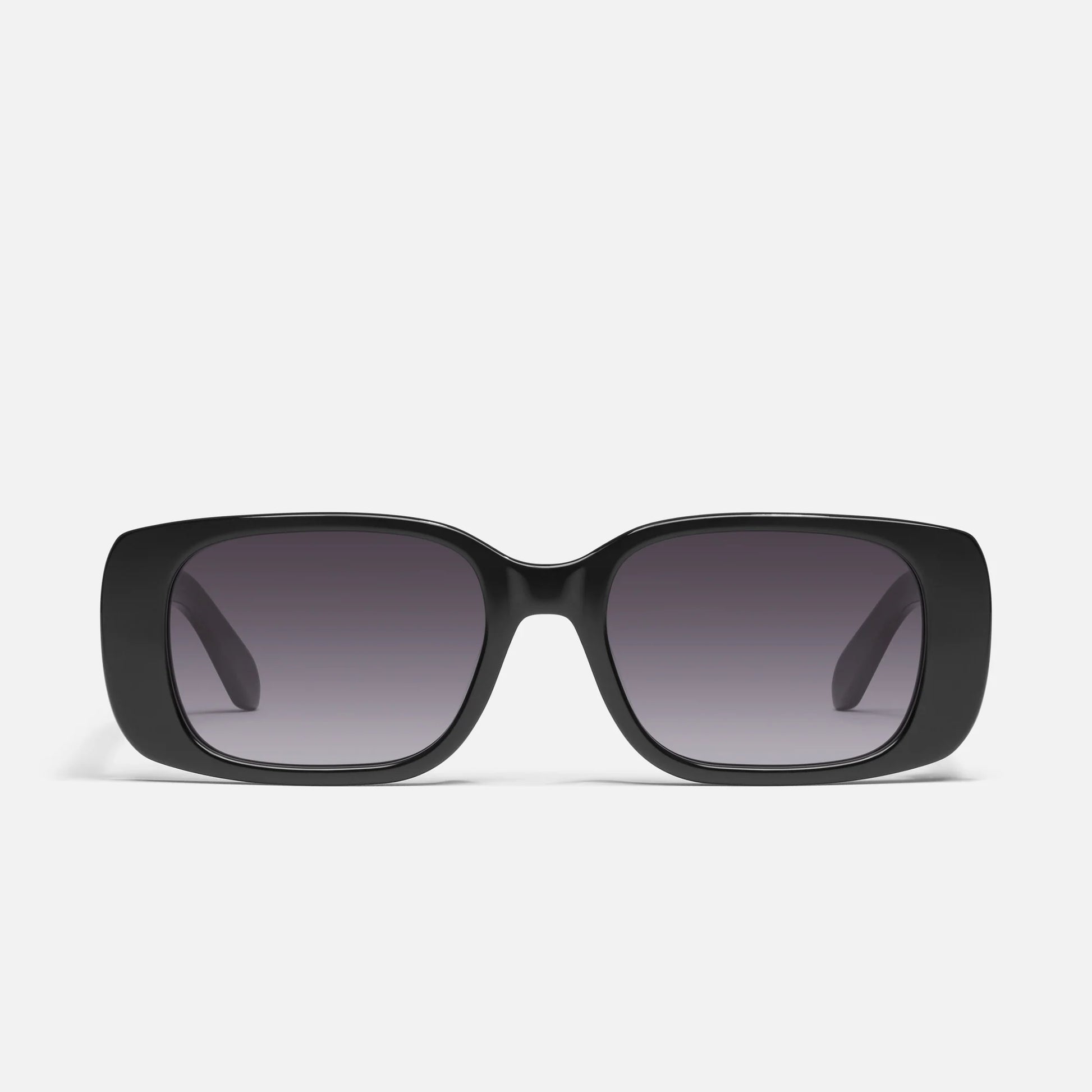 Black sunglasses with gradient lenses on a white background