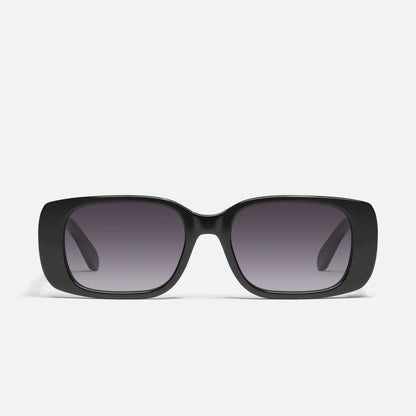 Black sunglasses with gradient lenses on a white background