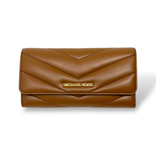 Michael Kors Cognac colored trifold wallet with gold toned logo. Picture features a front facing picture of the closed wallet