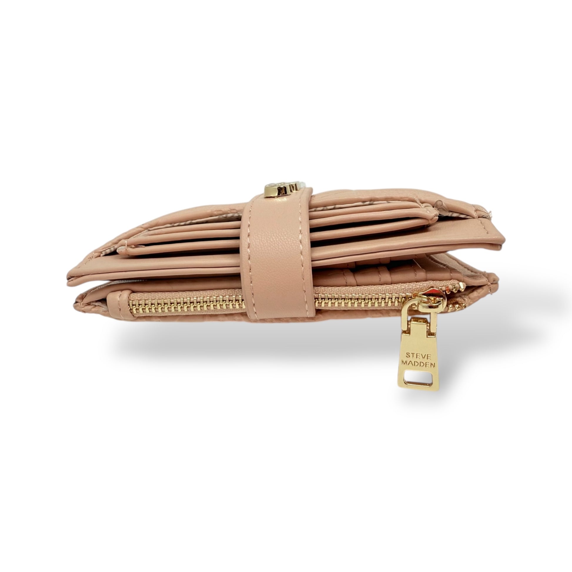 Steve Madden women's light pink wallet with removable card holder. Picture showing top view of closed wallet so you can see the zipper and composition of the wallet.