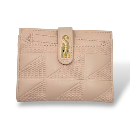 Steve Madden women's light pink wallet with removable card holder. Picture showing front view of the closed wallet so that you can see the closing strap with gold toned logo and the card holder in front pocket. 