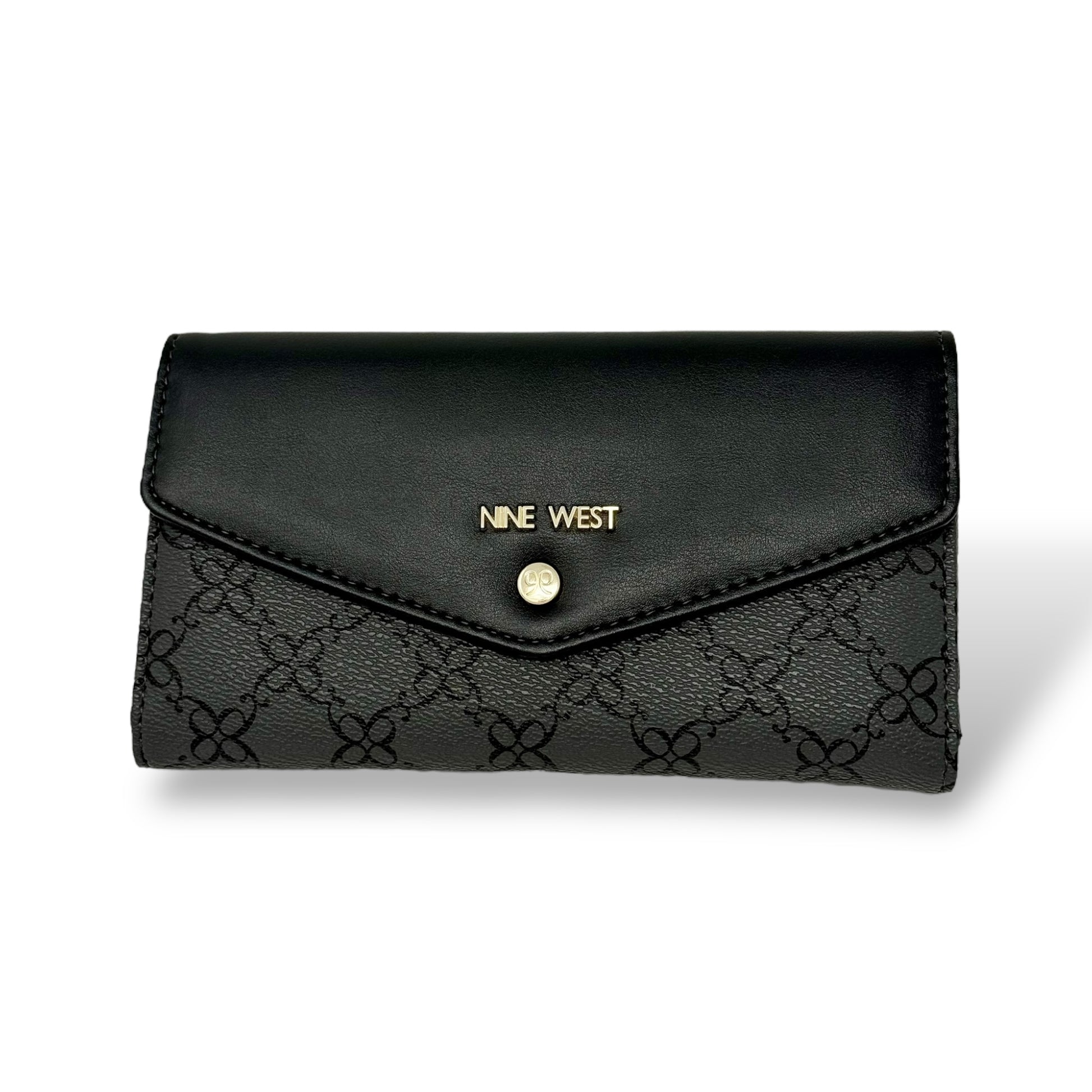 Nine West women’s trifold wallet. Black color with gold toned logo and snap button. Picture featuring front view of closed wallet with the gold toned logo