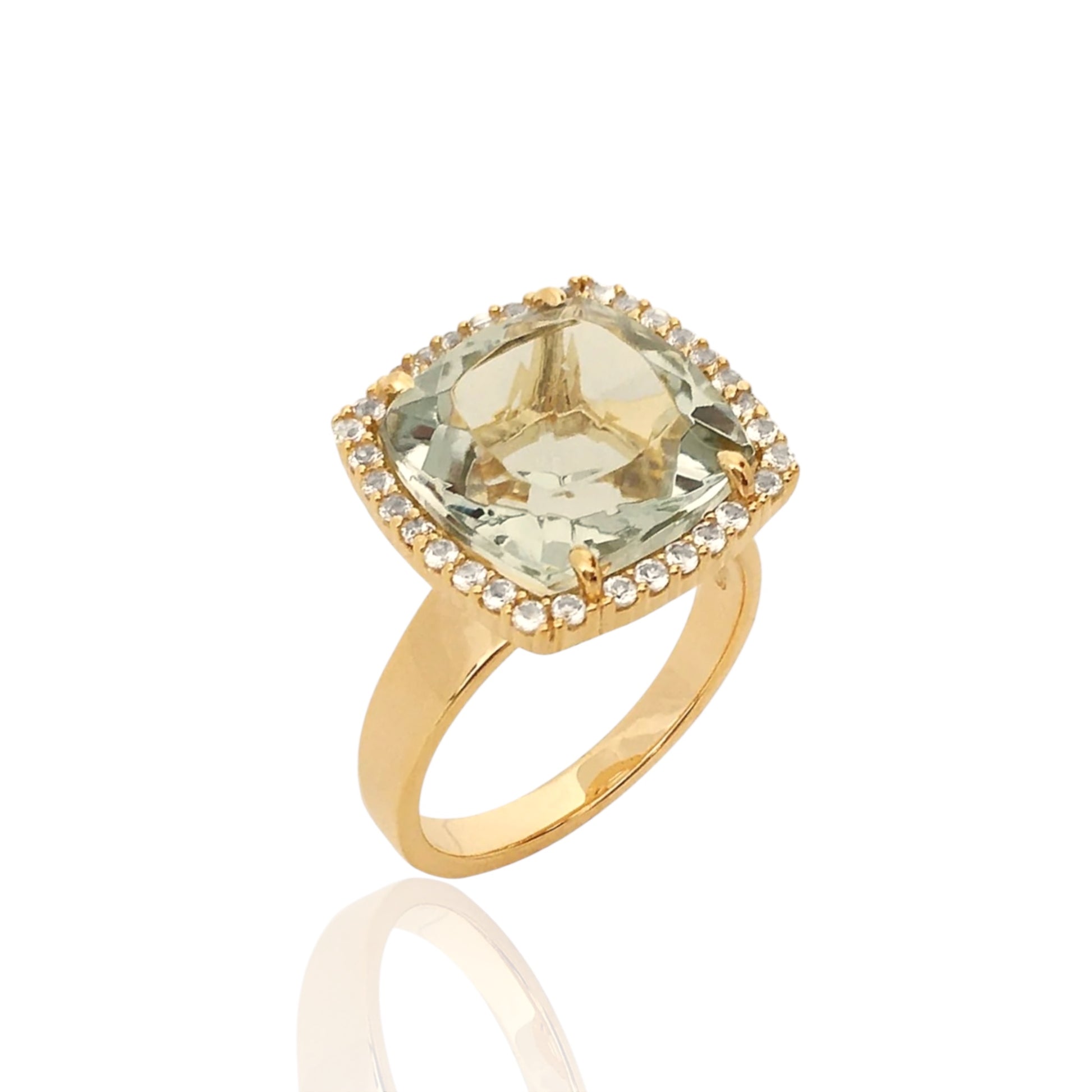 Gold ring with a green gemstone on a white background
18K Yellow Gold Vermeil over 925 Silver - 3.7 grs
Cushion cut Prasiolite - 12mm cushion gemstone w/ 5.6 cts
32 White Topaz round 1.0 mm diamond cut