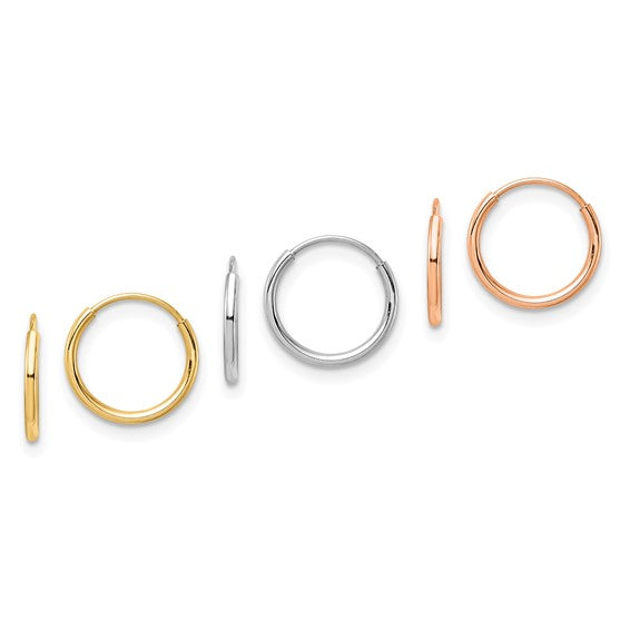gold, silver, and rose gold hoop earrings on a white background
Material: 14K Gold, 14k Rose Gold, or 14k White Gold
Closure: infinity&nbsp;
Measurement: 1&nbsp;mm thickness, 10.2 mm length, 10.2 mm width