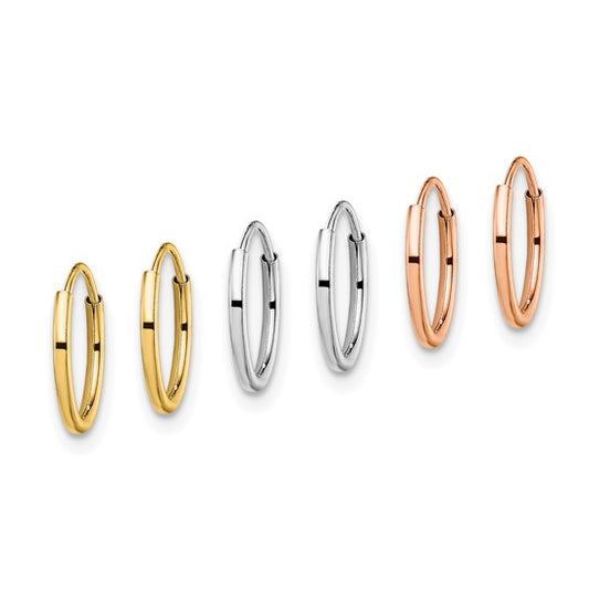 gold, silver, and rose gold hoop earrings on a white background
Material: 14K Gold, 14k Rose Gold, or 14k White Gold
Closure: infinity&nbsp;
Measurement: 1&nbsp;mm thickness, 10.2 mm length, 10.2 mm width