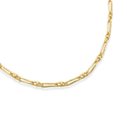 Gold chain necklace on a white background