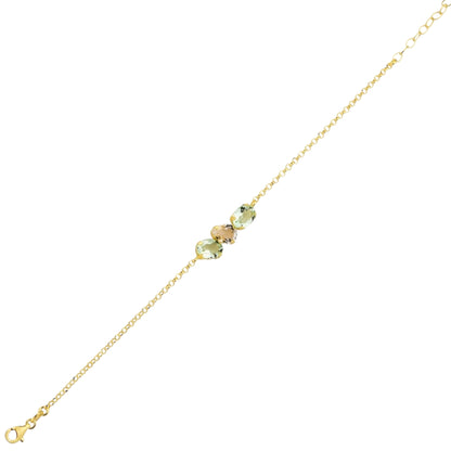 Gold bracelet with green gemstones on a white background
Material: 925 sterling silver, gold plated, light blue with white or light green with white Swarovski crystals&nbsp;

Color: gold, light blue with white or light green with white

Measurement: 6" length, 1" extension, 5 mm wide trio Swarovski Crystals