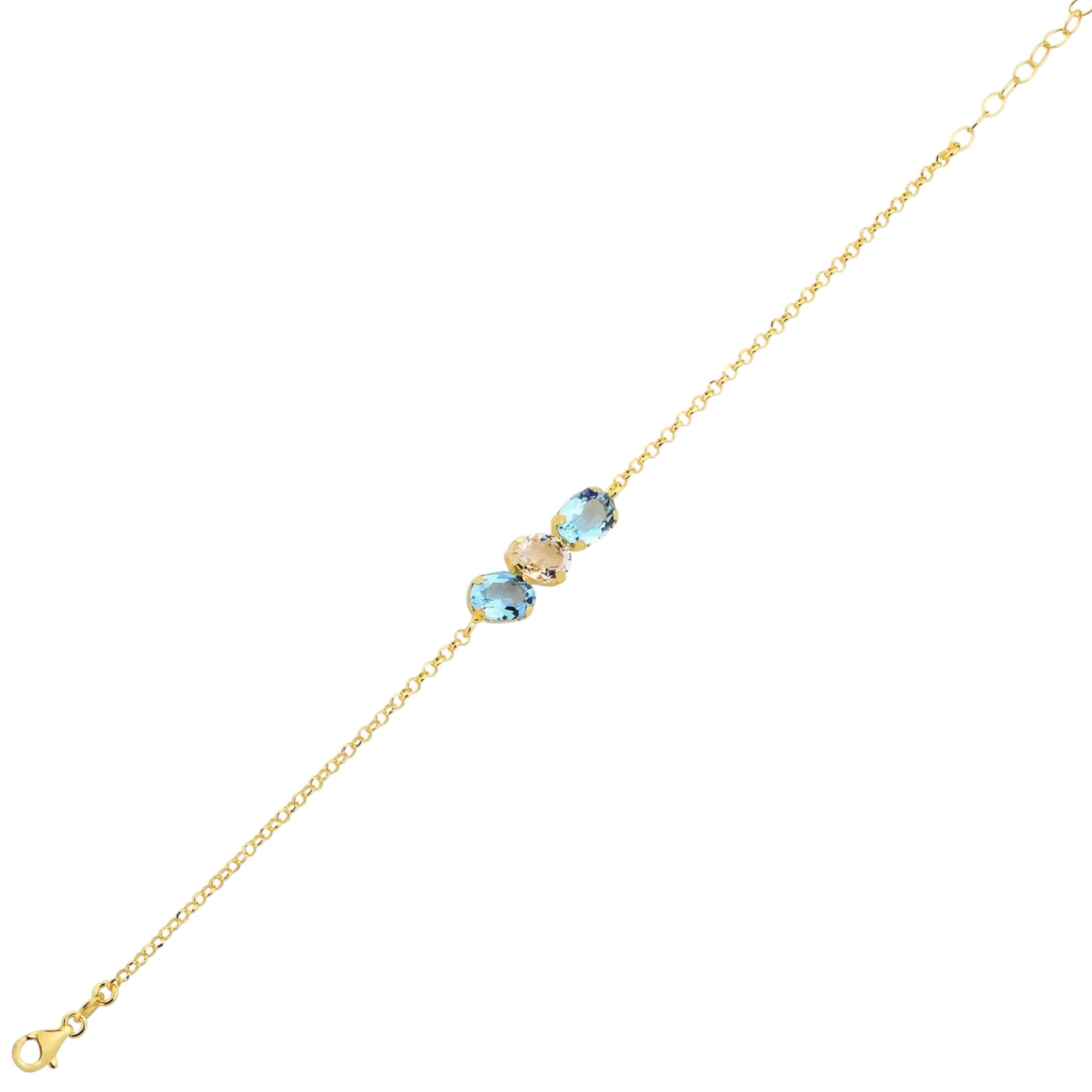 Gold bracelet with blue gemstones on a white background
Material: 925 sterling silver, gold plated, light blue with white or light green with white Swarovski crystals&nbsp;

Color: gold, light blue with white or light green with white

Measurement: 6" length, 1" extension, 5 mm wide trio Swarovski Crystals