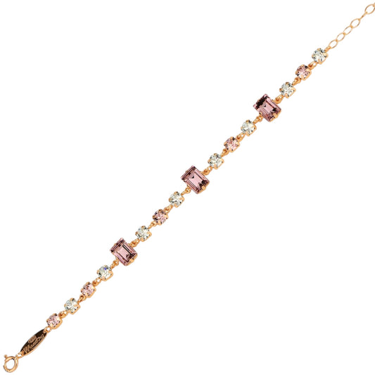 Material: 925 sterling silver, 3 light pink rectangle and light blue circle Swarovski crystals 

Color: silver, pink and blue 

Measurement: 6" length, 1.5" extension, 8 mm wide