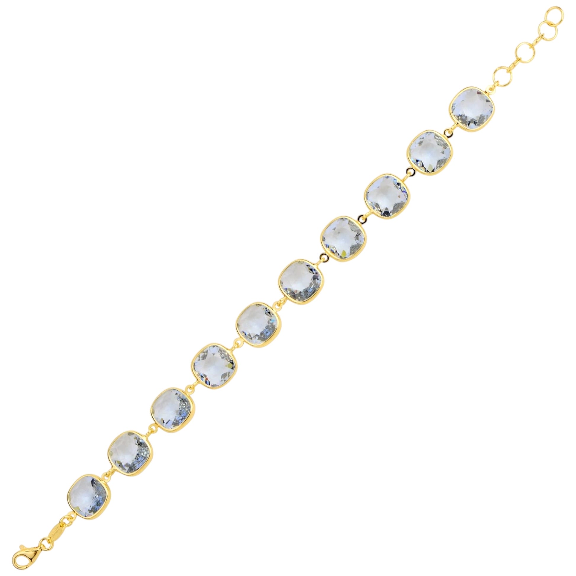 Gold bracelet with blue crystals on a white background
Material: 925 sterling silver, Rhodium plated, purple and light rose Swarovski crystals&nbsp;

Color: silver, purple, and light rose

Measurement: 6" length, 1" extension, 10 mm wide&nbsp;