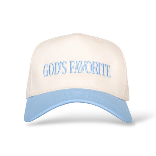 Cap with 'God's Favorite' text on a white background
Color: tan and light blue two-toned hat

Style: 5 panel structured fabric trucker hat

Closure: snapback adjustable sizing

Material: 65% polyester, 35% cotton
