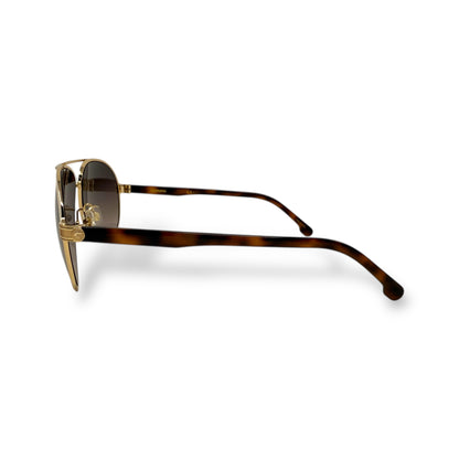 Sunglasses with tortoiseshell frame and gold accents on a white background
Carrera - 1051/S 0Y3R HA

Frame style: Aviator, lightweight&nbsp;

Frame Color: gold wire frame with brown tortoise shell arms

Lens Color: brown gradient