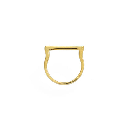 Gold ring with a unique design on a white background