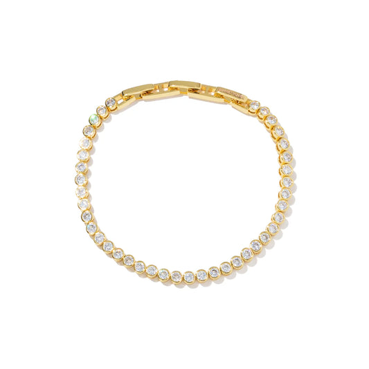 Gold bracelet with clear stones on a white background