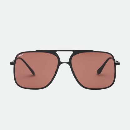 Sunglasses with brown lenses and black frames on a white background