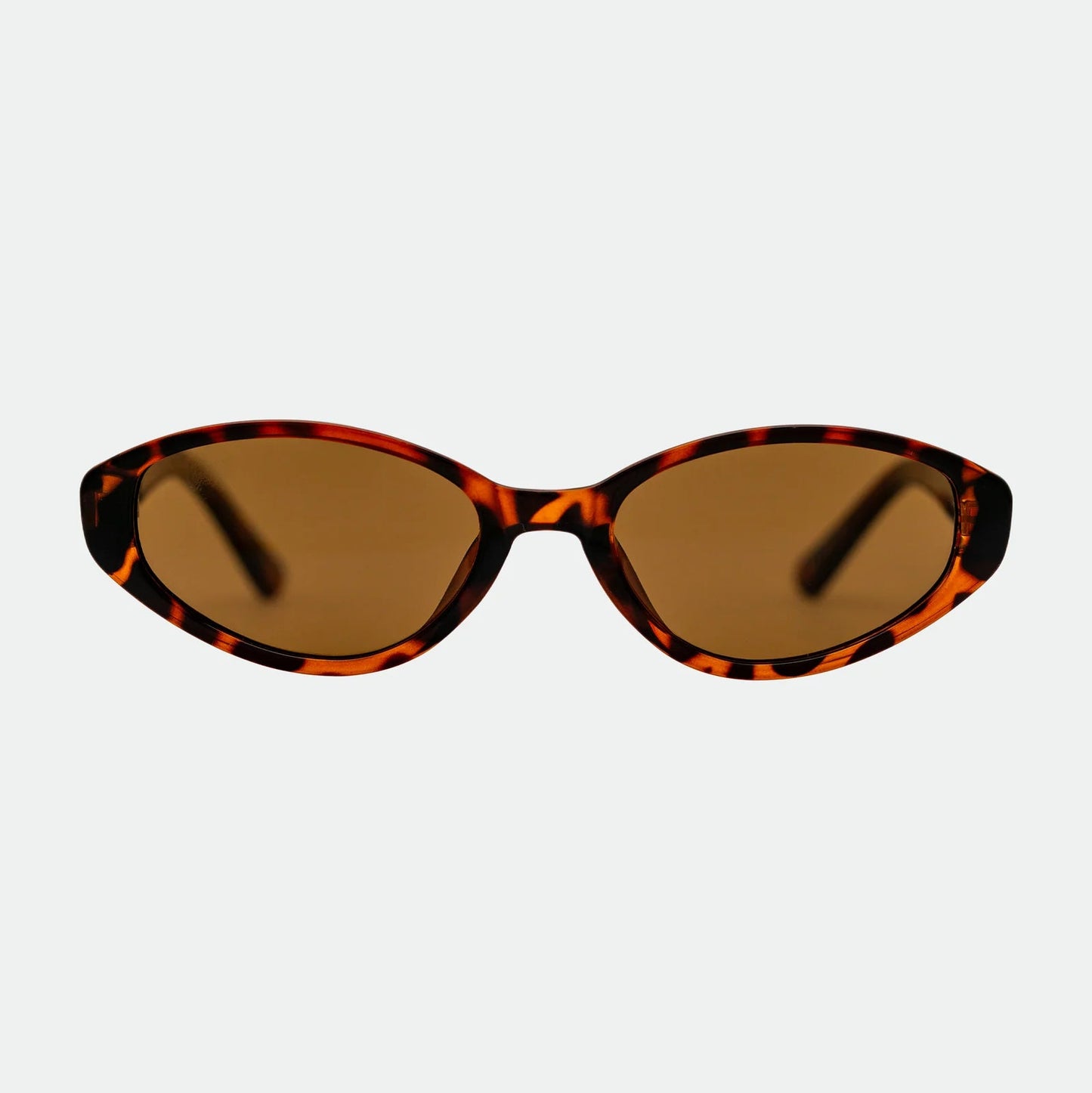 Sunglasses with tortoiseshell frame and brown lenses on a white background