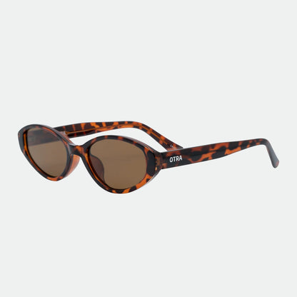 Sunglasses with tortoiseshell frame and brown lenses on a white background