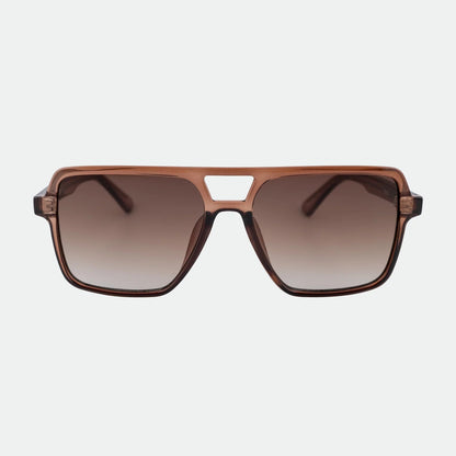 Brown sunglasses with a gradient lens on a light gray background