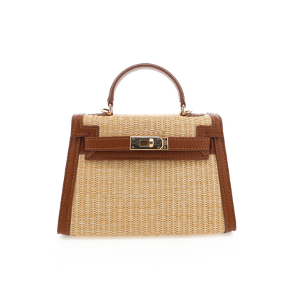 Handbag with woven design and brown leather accents on a white background