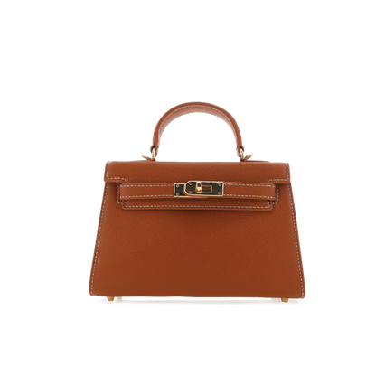 Brown handbag with gold hardware on a white background