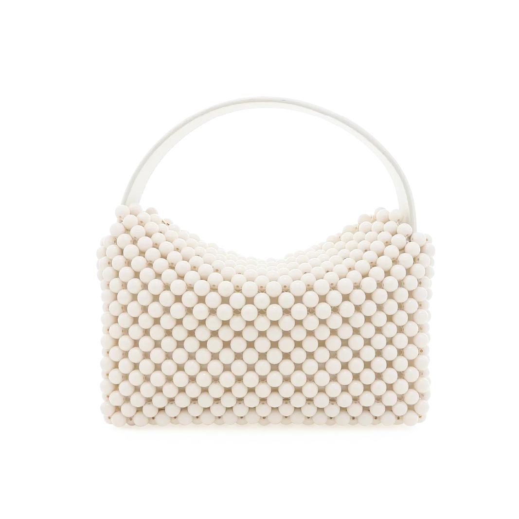 Beige handbag with a round handle on a white background