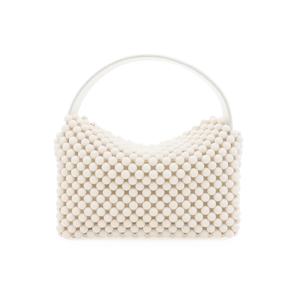 Beige handbag with a round handle on a white background