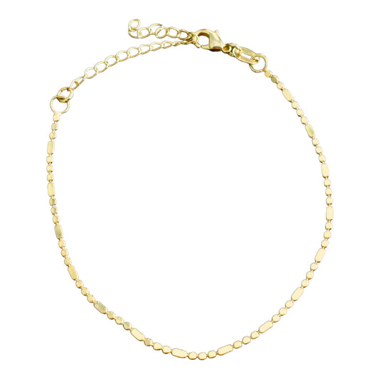 Gold bracelet on a white background