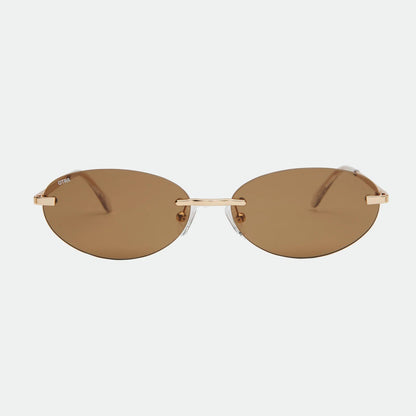 Sunglasses with gold frame and brown lenses on a white background