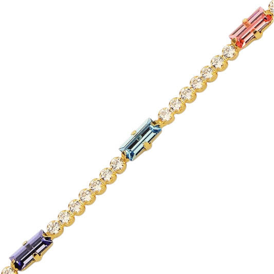 Gold bracelet with multicolored crystals on a white background