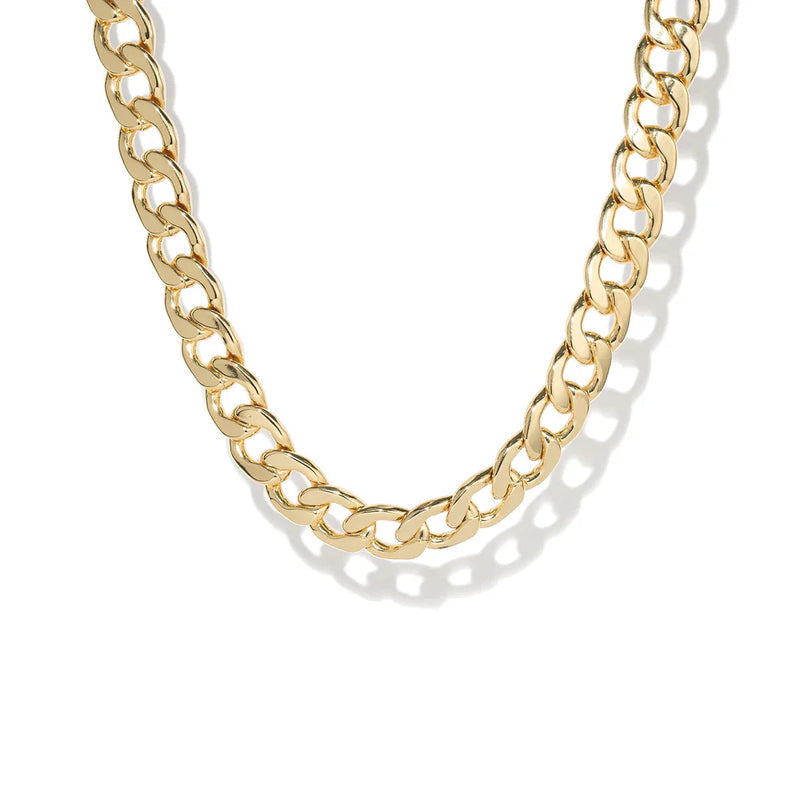 Gold chain necklace on a white background