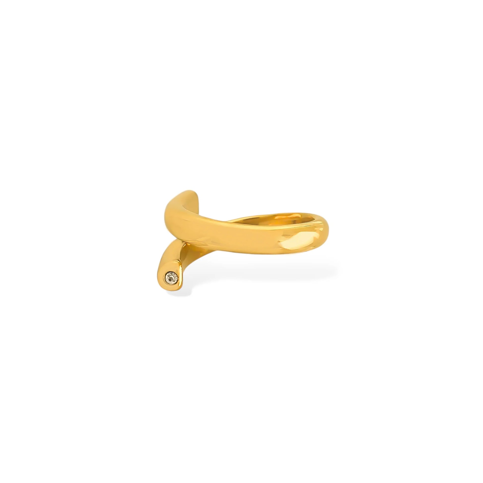 Gold ring with a curved design on a white background