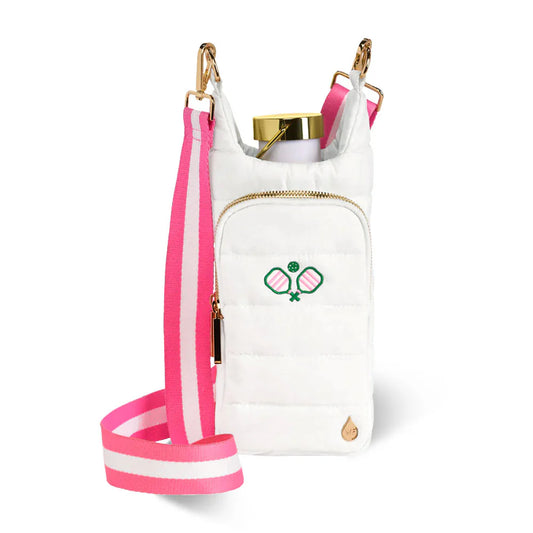 White bag with pink strap and gold accents on a white background