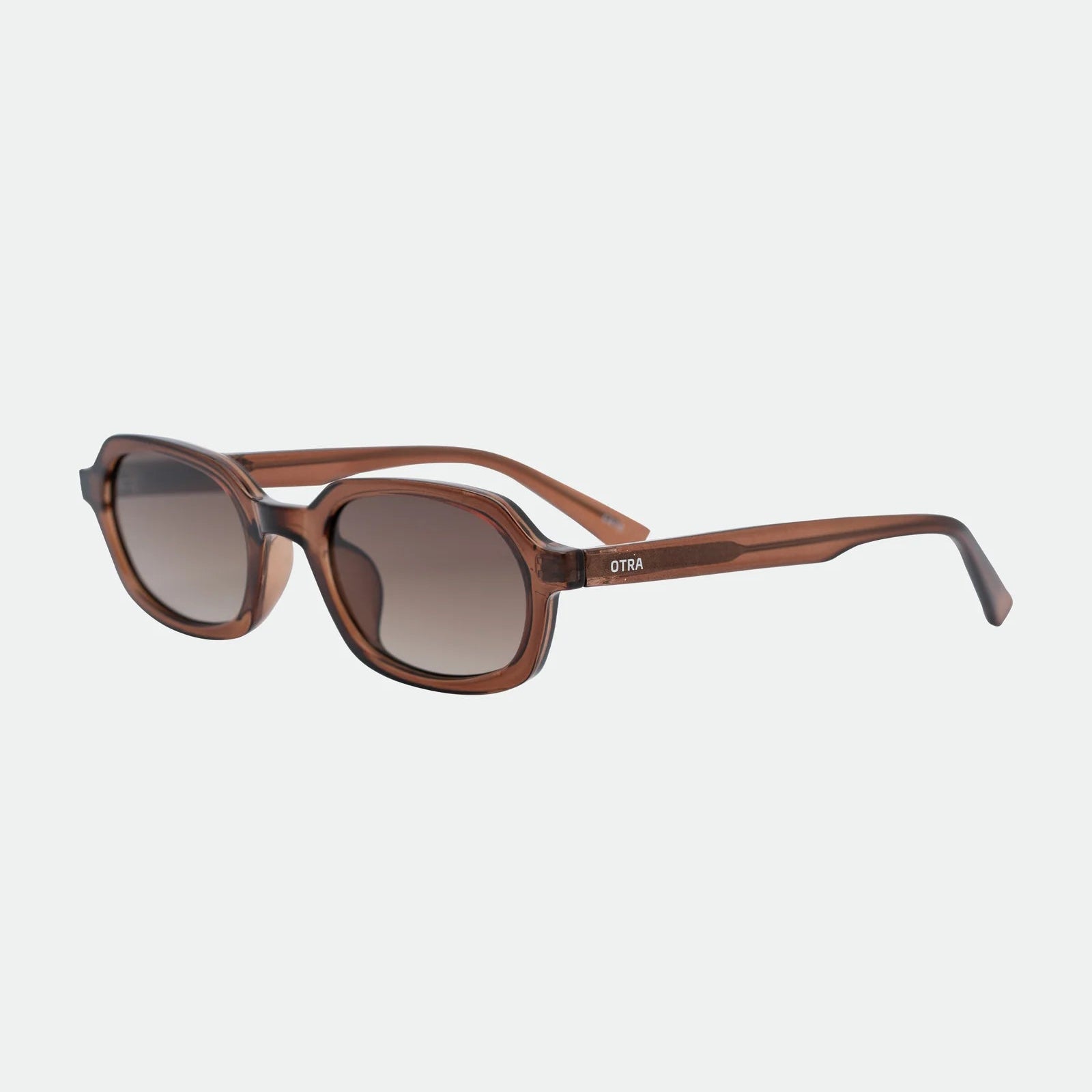 Brown sunglasses on a light gray background