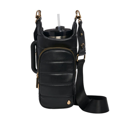 Black leather crossbody bag with a cup holder on a white background