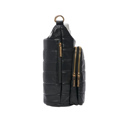 Black quilted crossbody bag with gold zippers on a white background