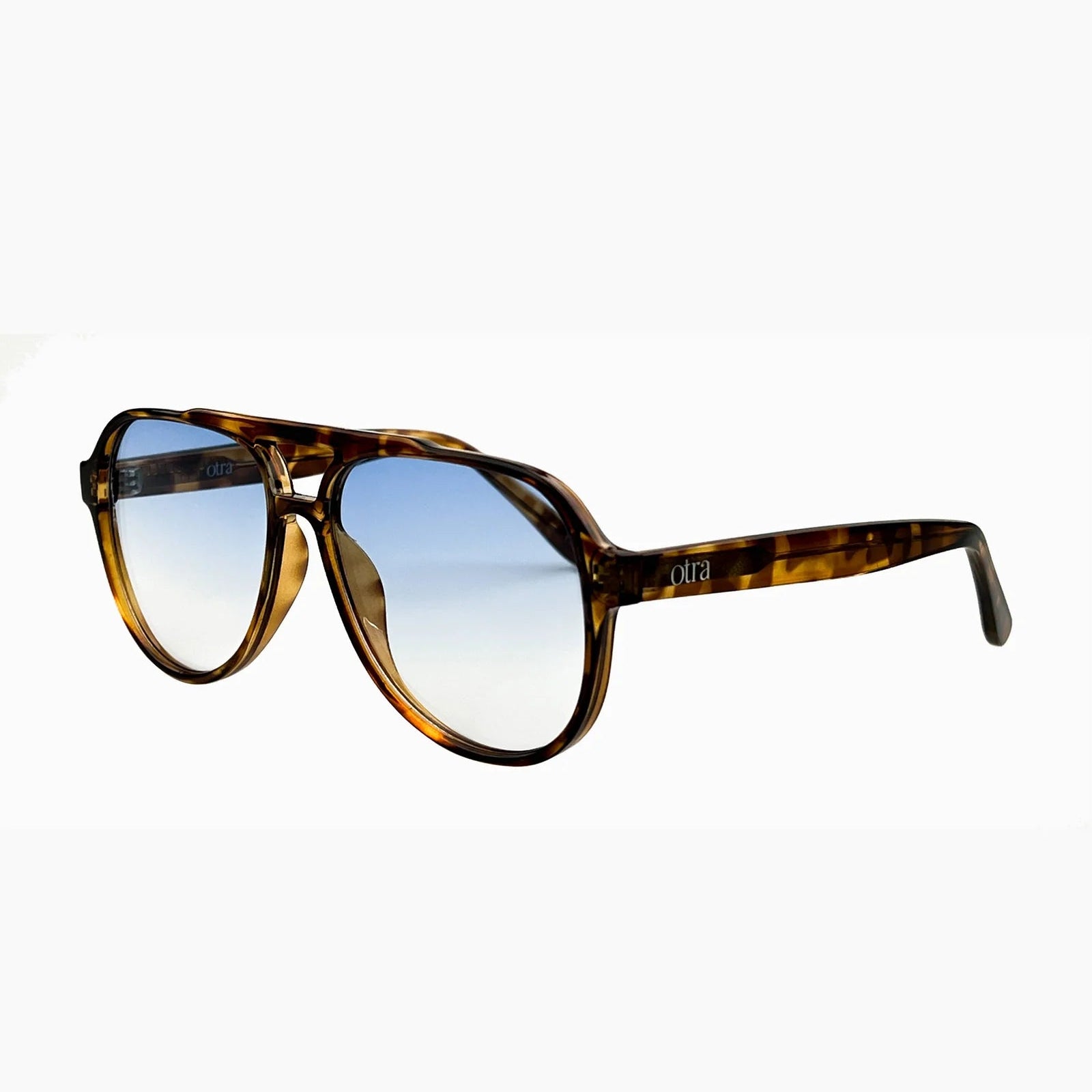 Sunglasses with tortoiseshell frame and blue gradient lenses on a white background