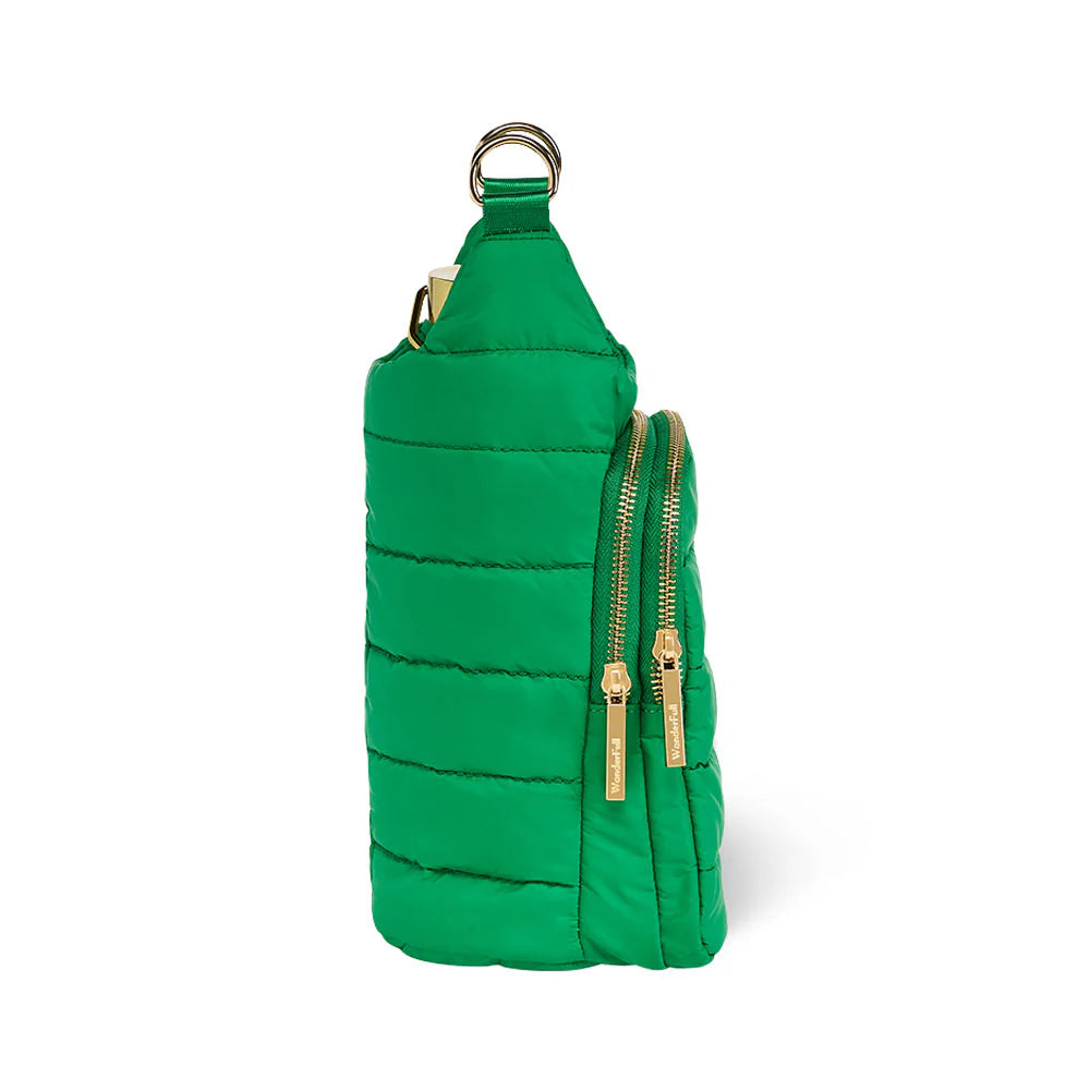 Green quilted bag with gold zipper on a white background