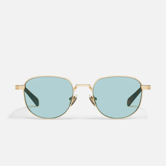 Gold-framed sunglasses with light blue lenses on a white background