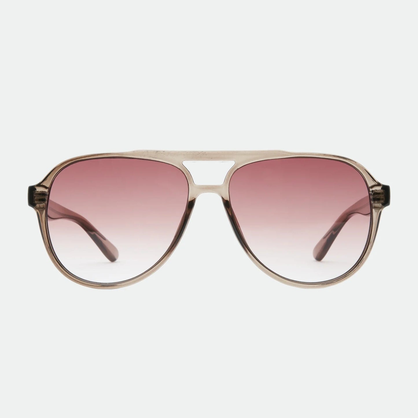Sunglasses with pink gradient lenses on a white background