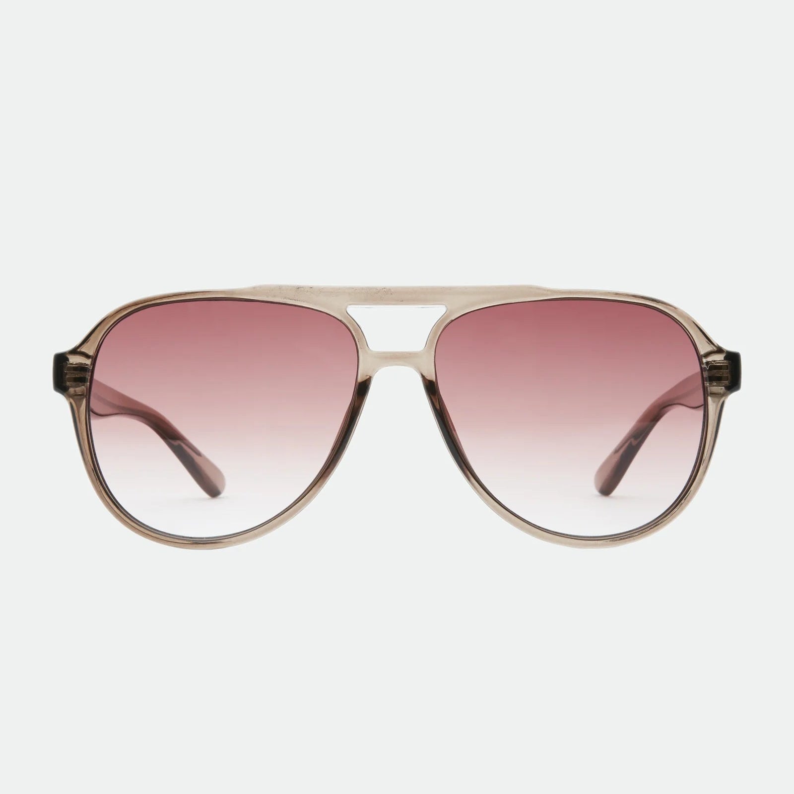 Sunglasses with pink gradient lenses on a white background