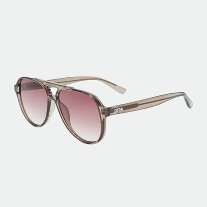 Sunglasses with a gradient pink lens on a white background